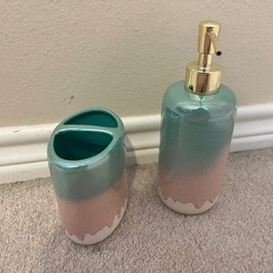 Matching Blue and Pink Toothbrush Holder and Soap Dispenser